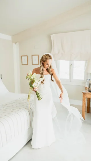 Instagram reel: bride holding calla lilies in a bright room