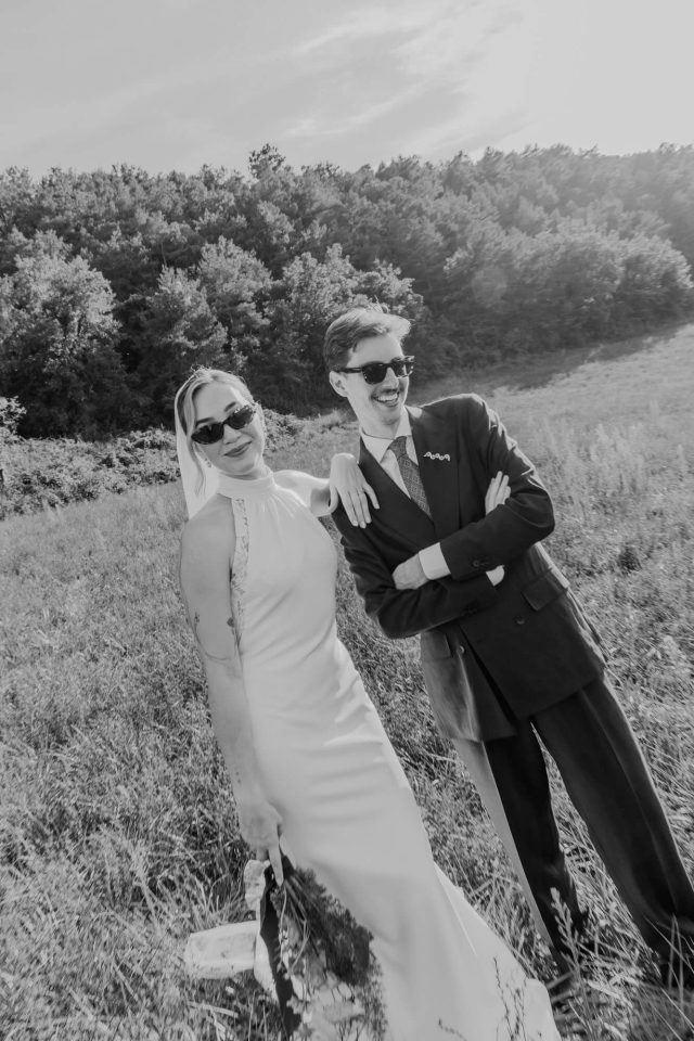 Black and white portrait of a couple in a summer meadow